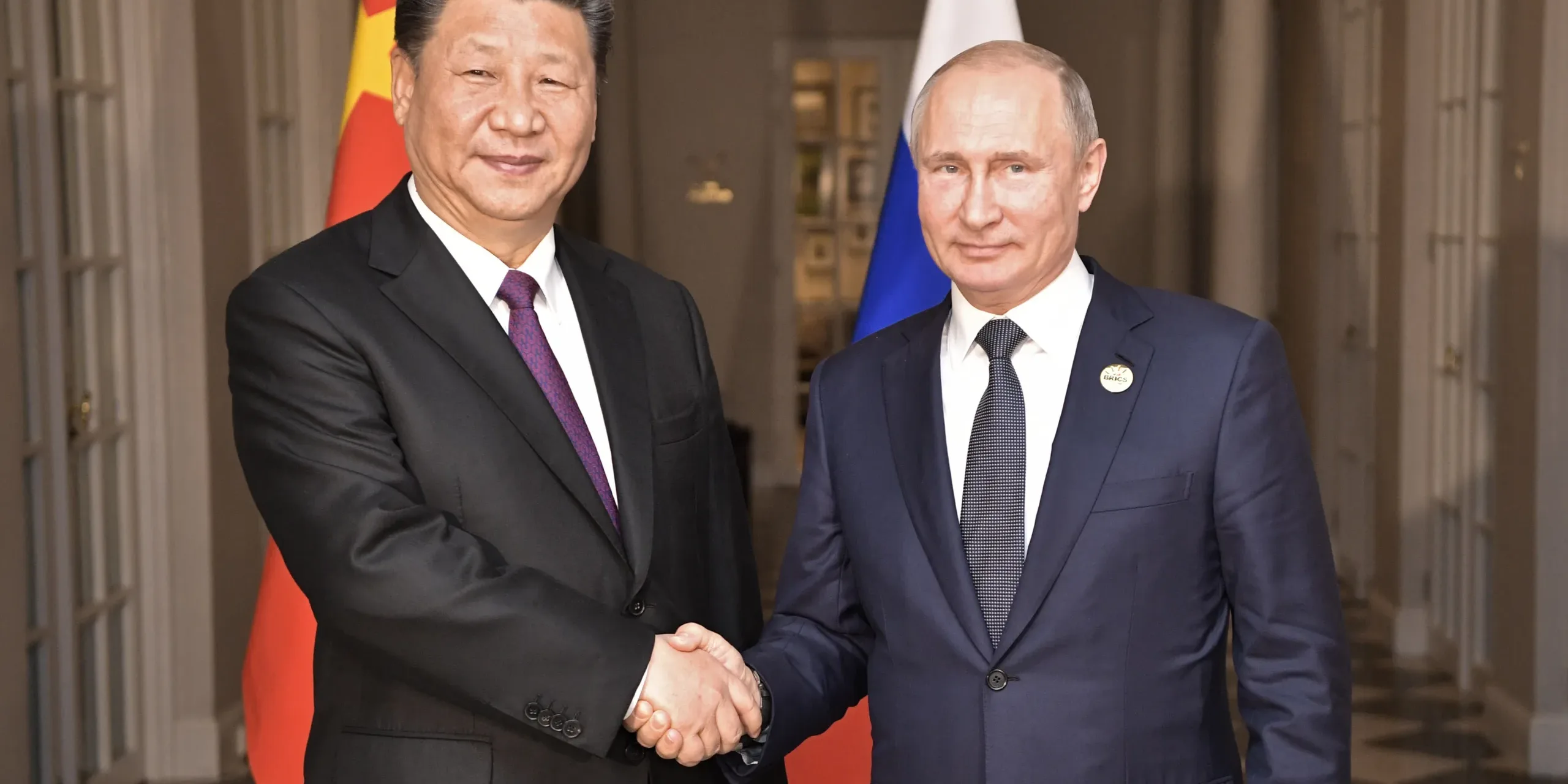 Vladimir_Putin_and_Xi_Jinping,_26_july_2018_(1)